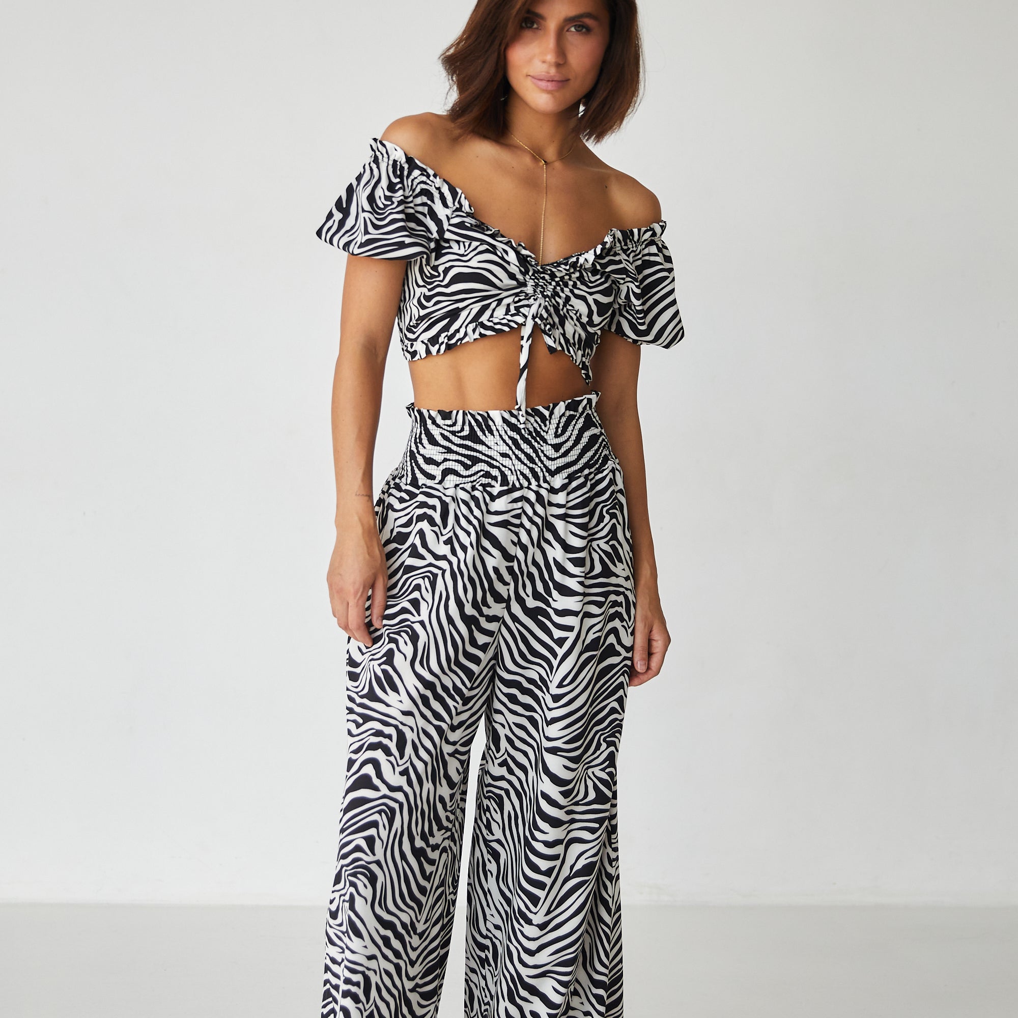 Брюки з високою резинкою