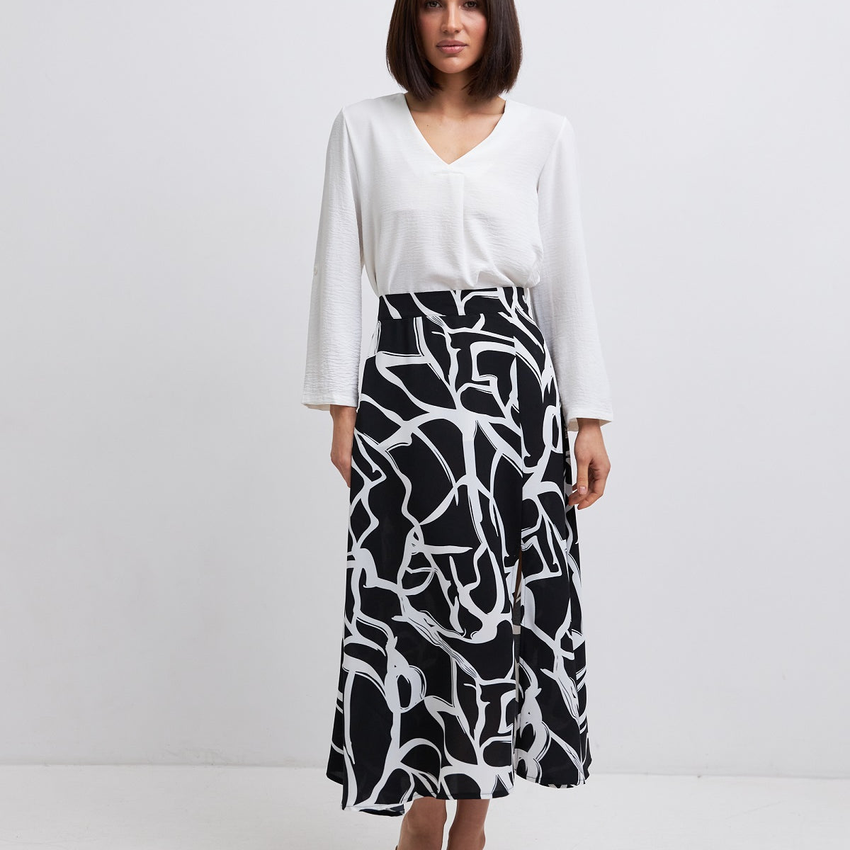 Спідниця міді з розрізом