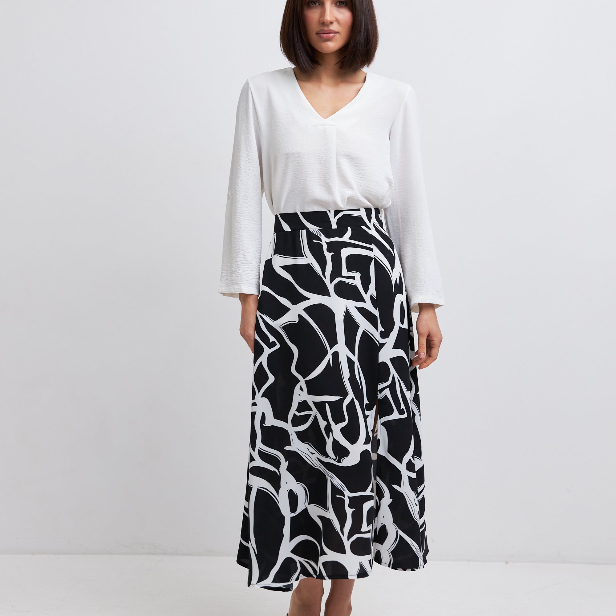 Спідниця міді з розрізом