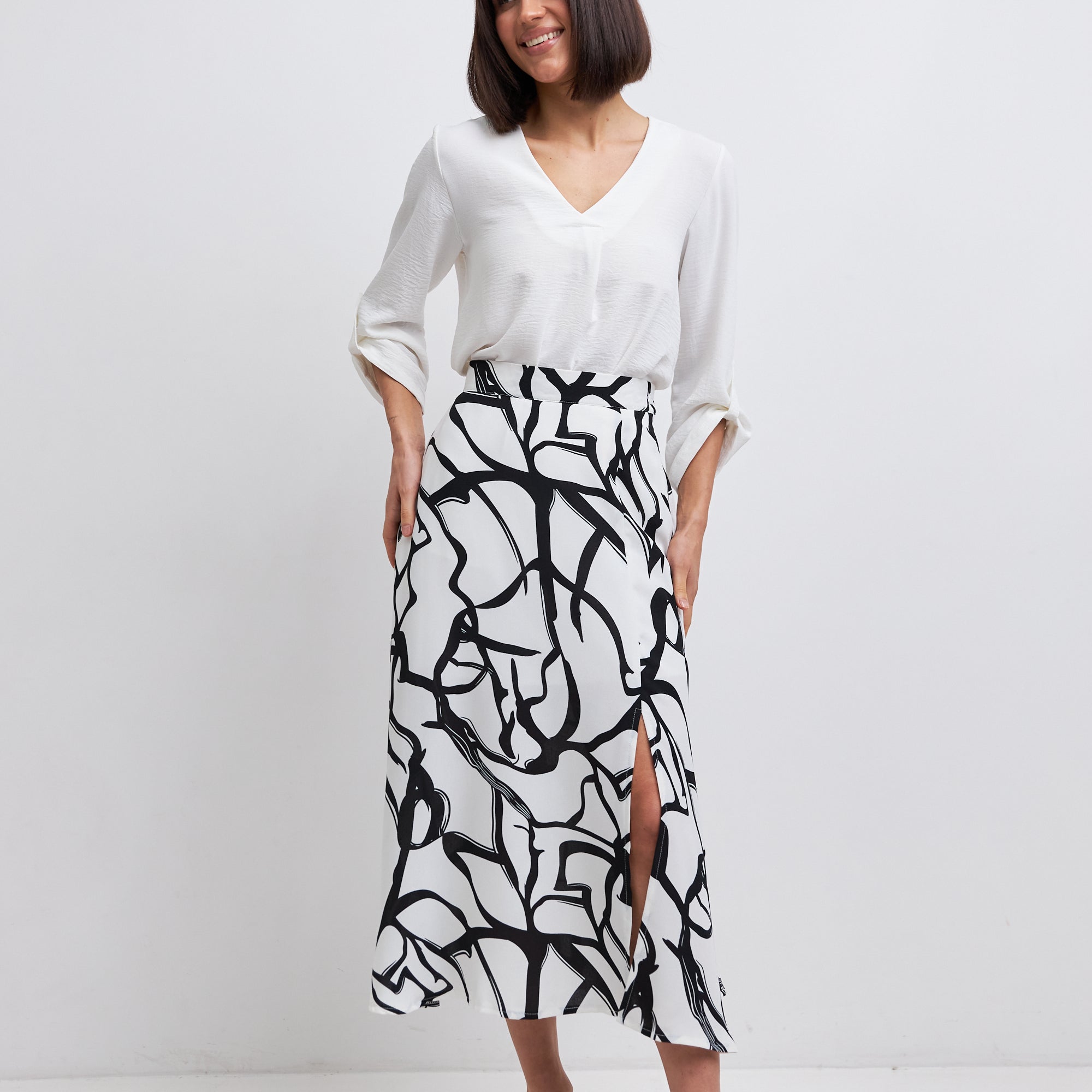 Спідниця міді з розрізом