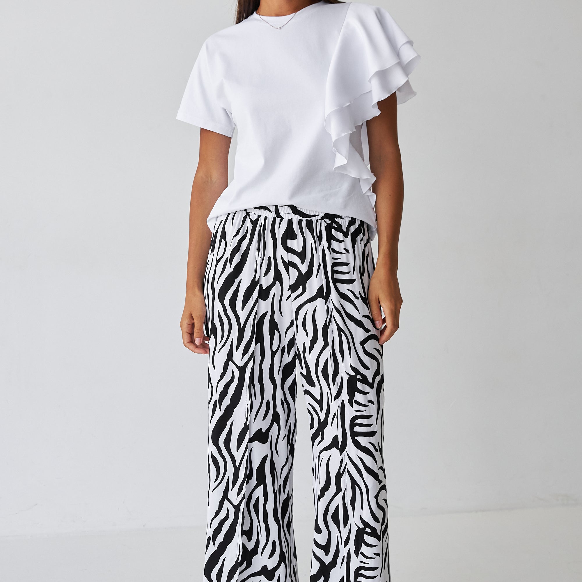 Брюки з імітацією запаху