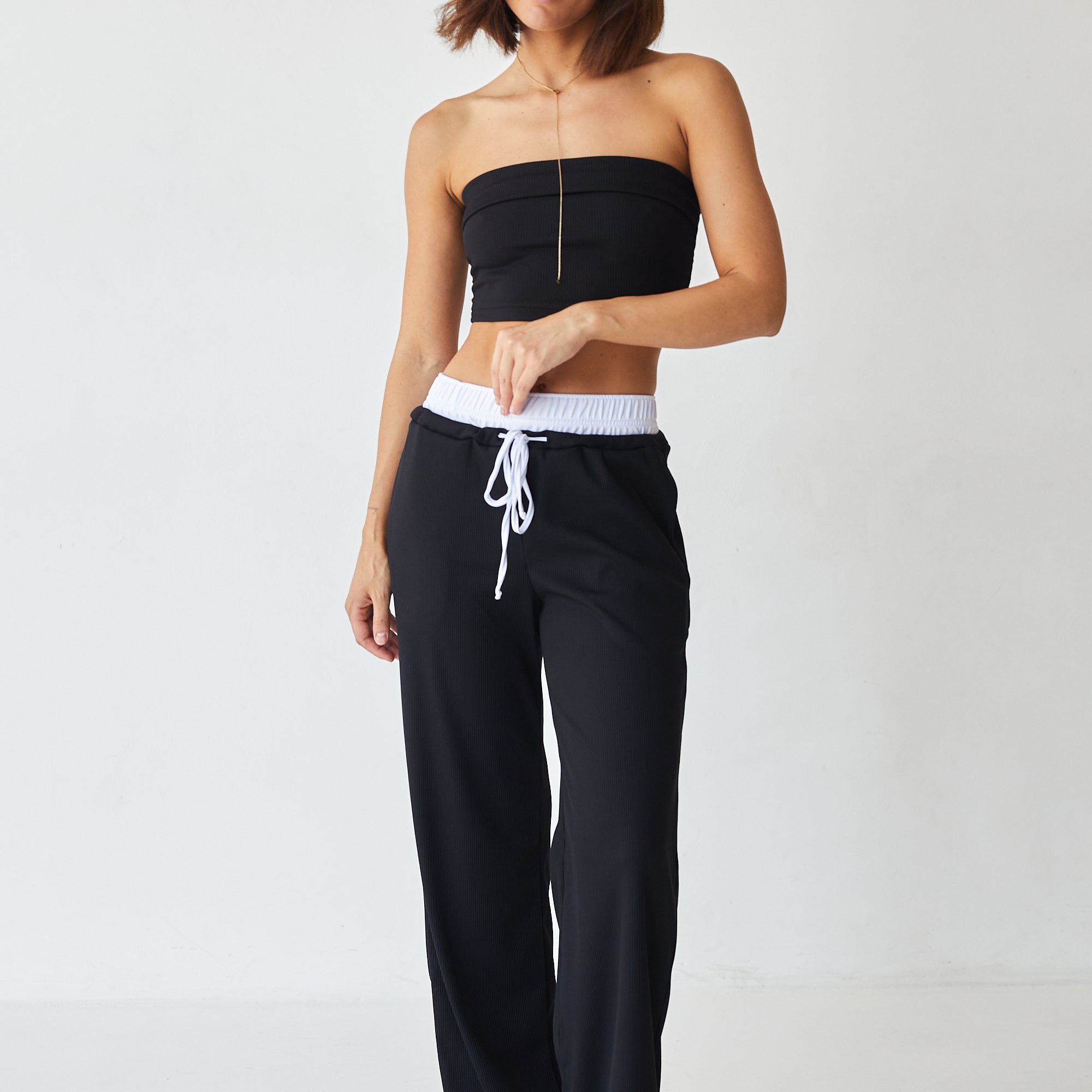 Брюки із рубчика з білим поясом із мікродайвінгу