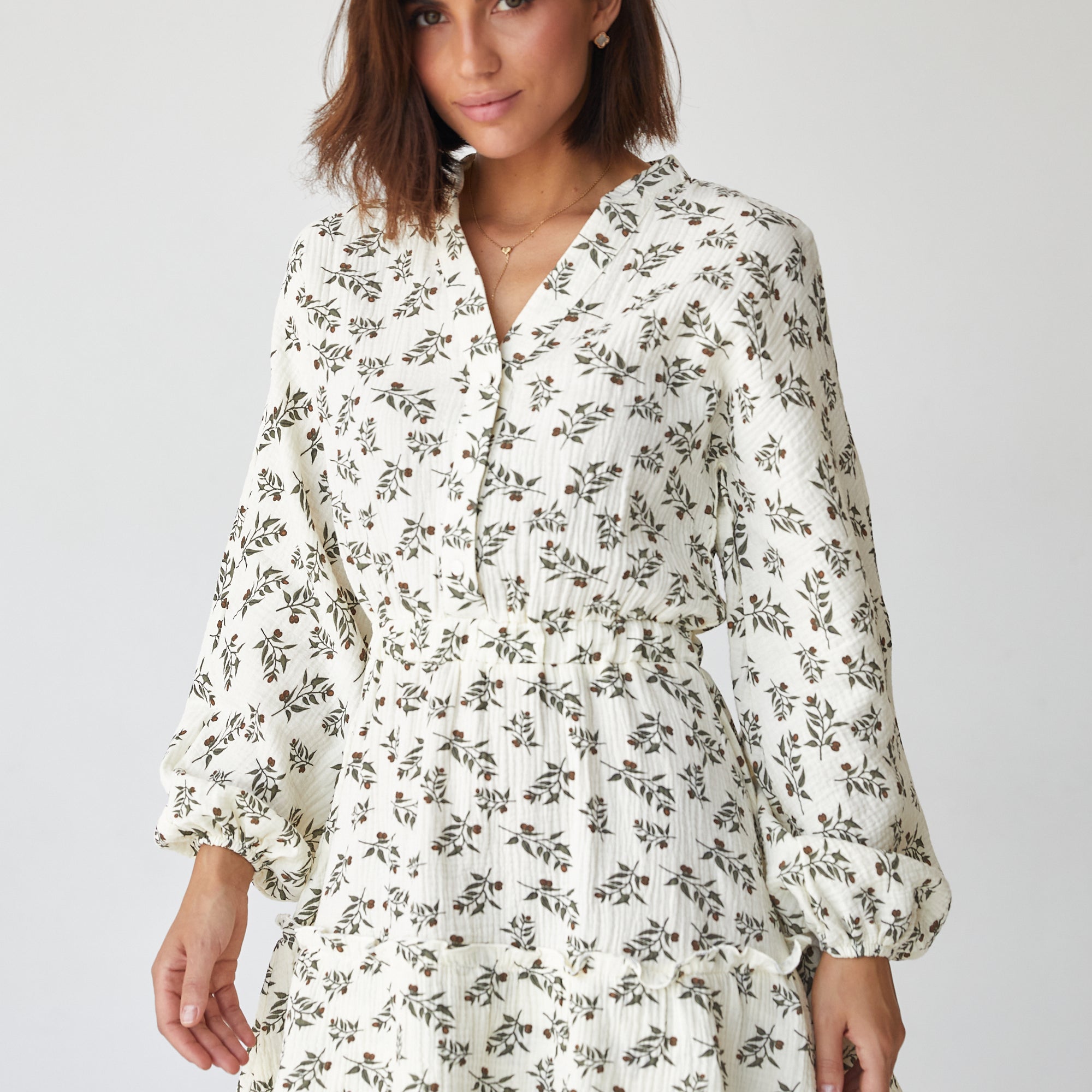 Сукня міні з воланом