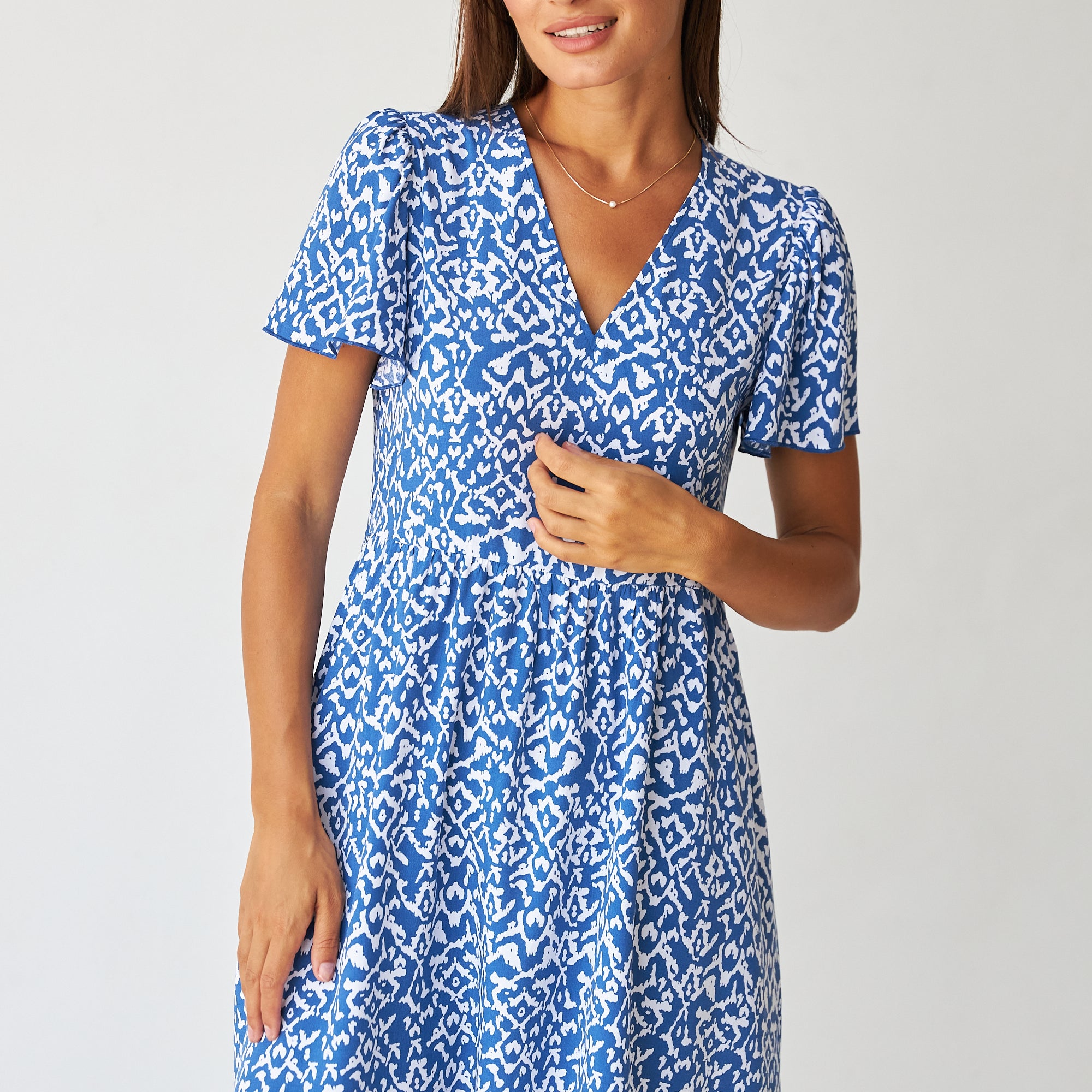 Сукня з декоративною спиною