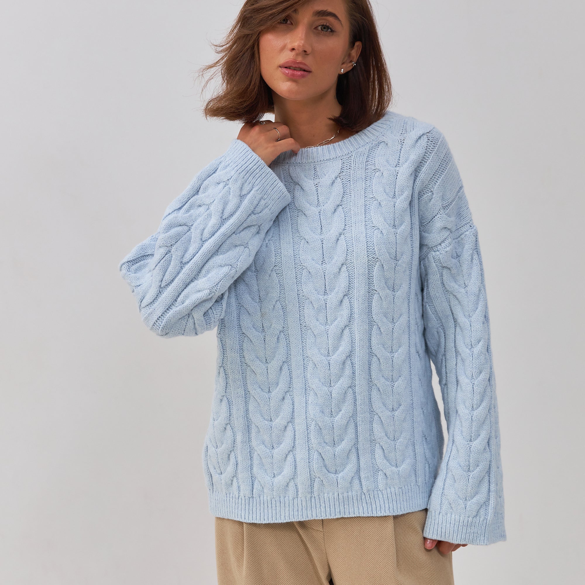 Светр в'язка з косами