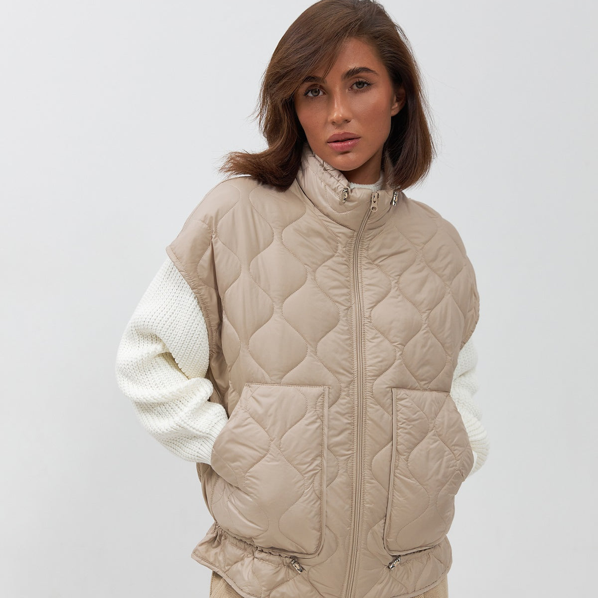 Жилет стьобаний з накладними кишенями