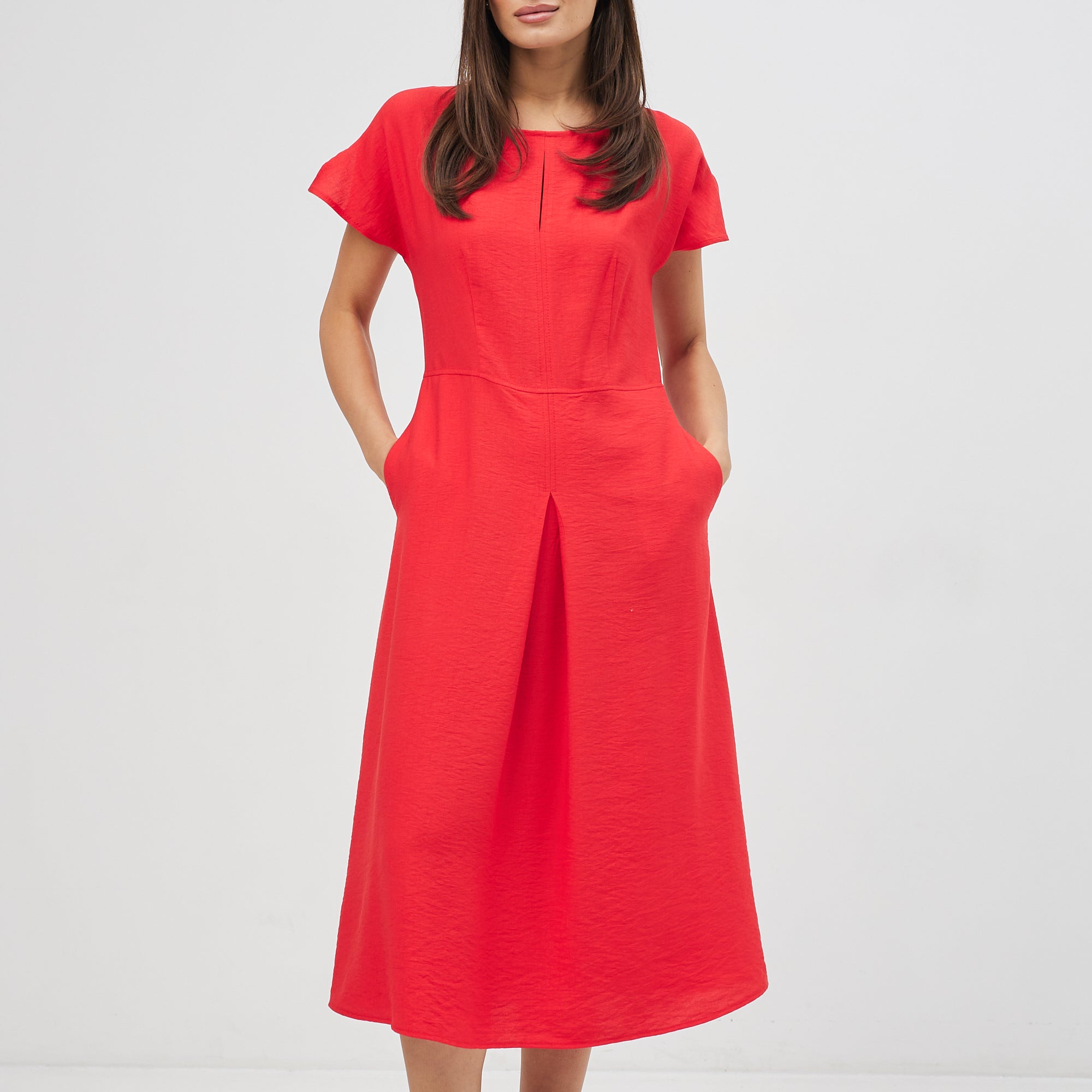 Сукня зі складою на спідниці