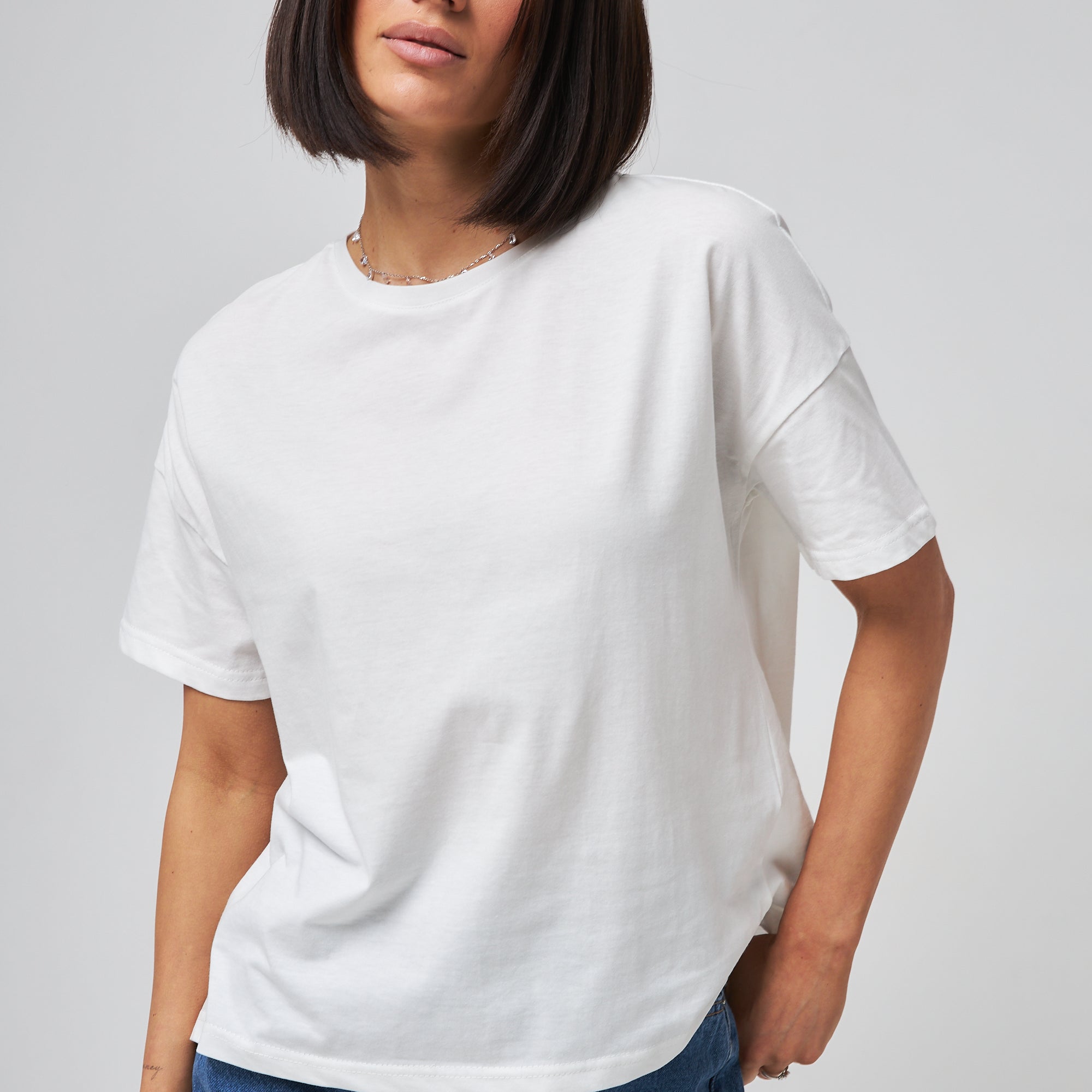 Футболка з подовженою спинкою та розрізами