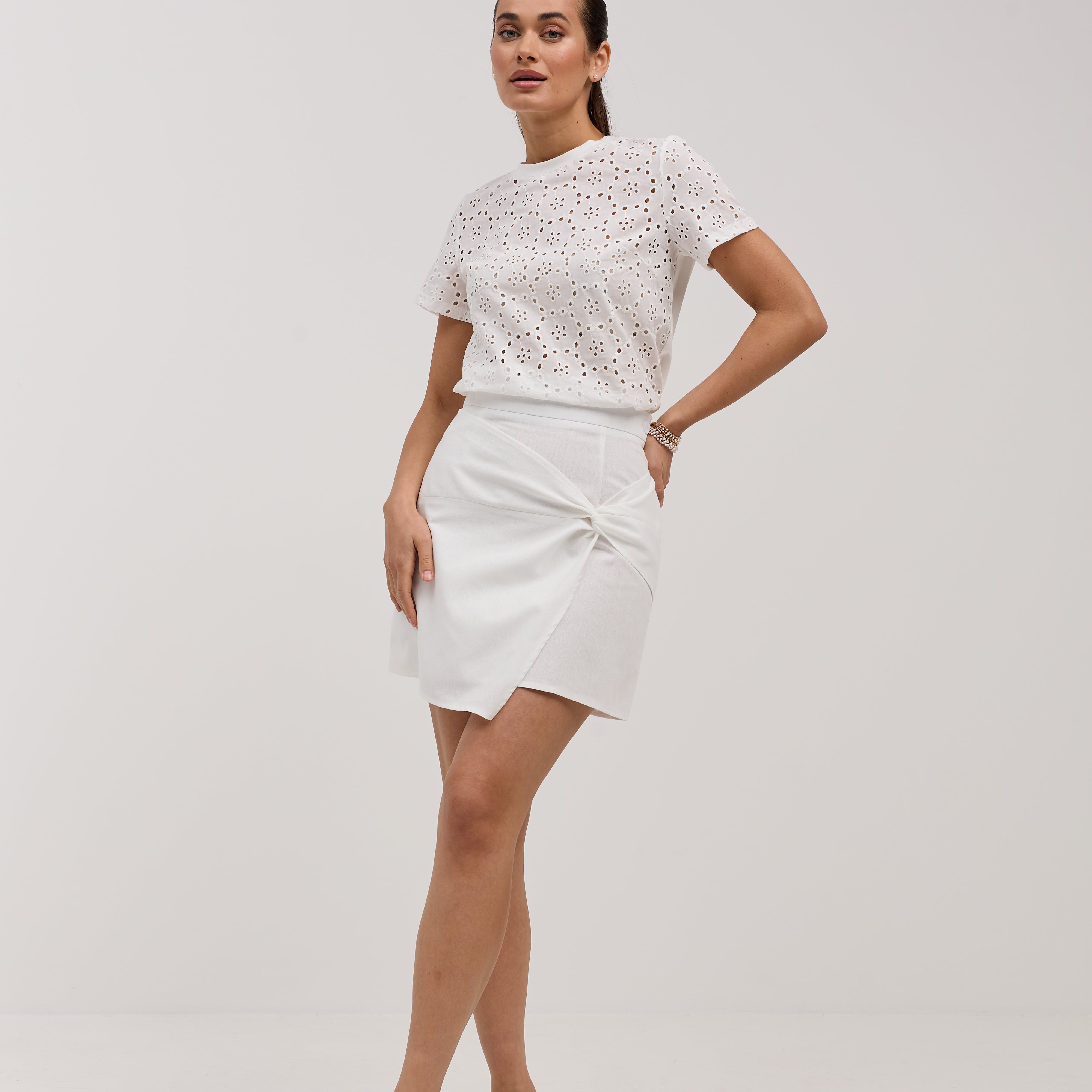 Спідниця міні з перекрутом