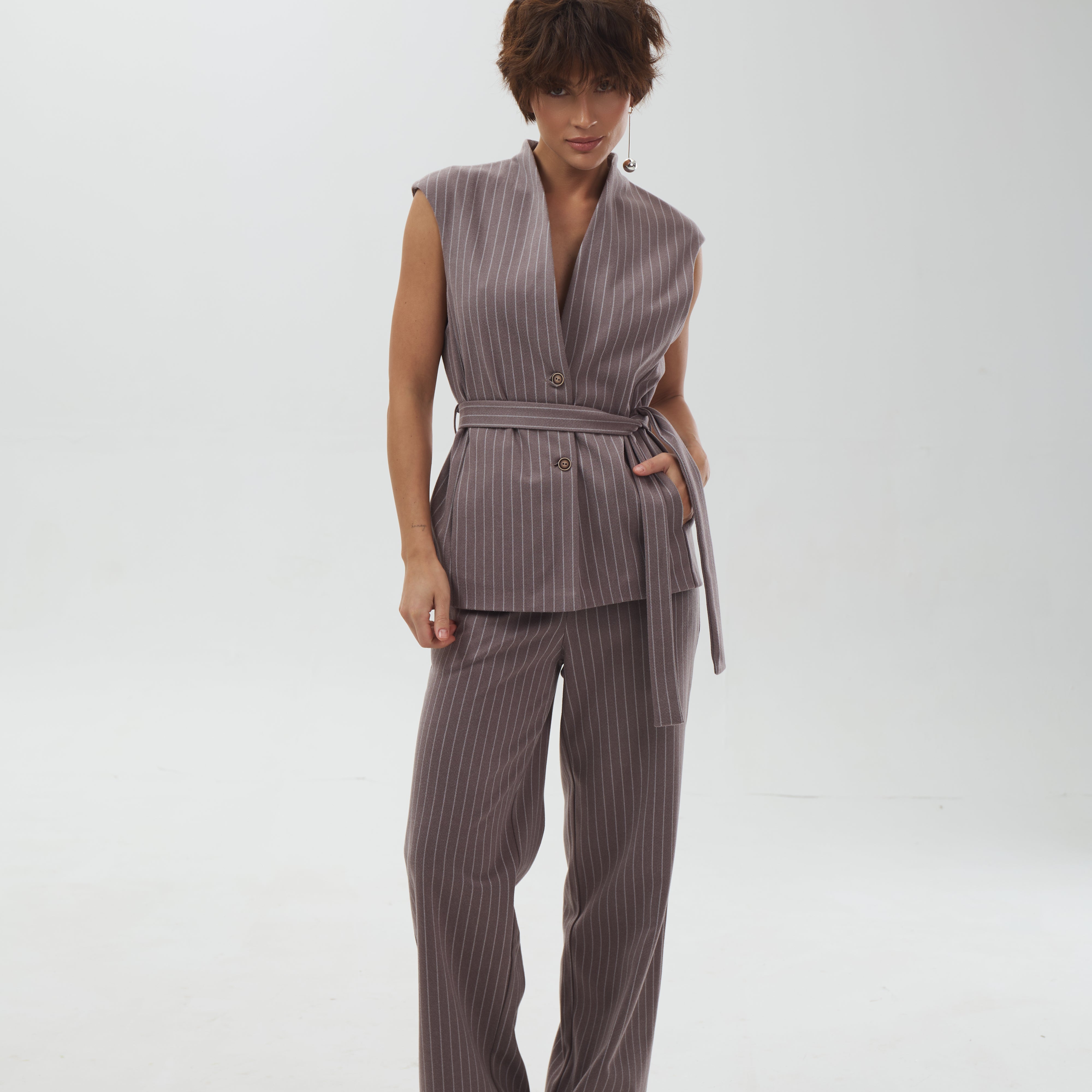 Широкі штани-палаццо у тонку смужку з високою посадкою