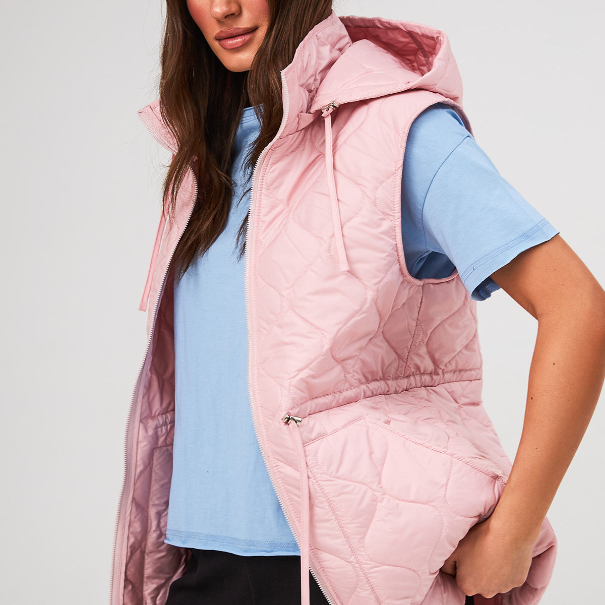 Жилет стьобаний з накладними кишенями